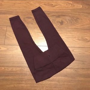 Purple Lululemon Wunder Unders with bag